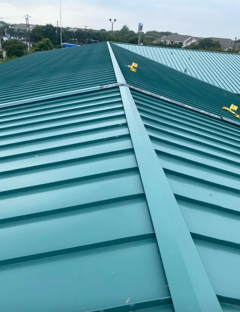 Green commercial metal roof ridge and valley for Metal Roof Repair in North Providence