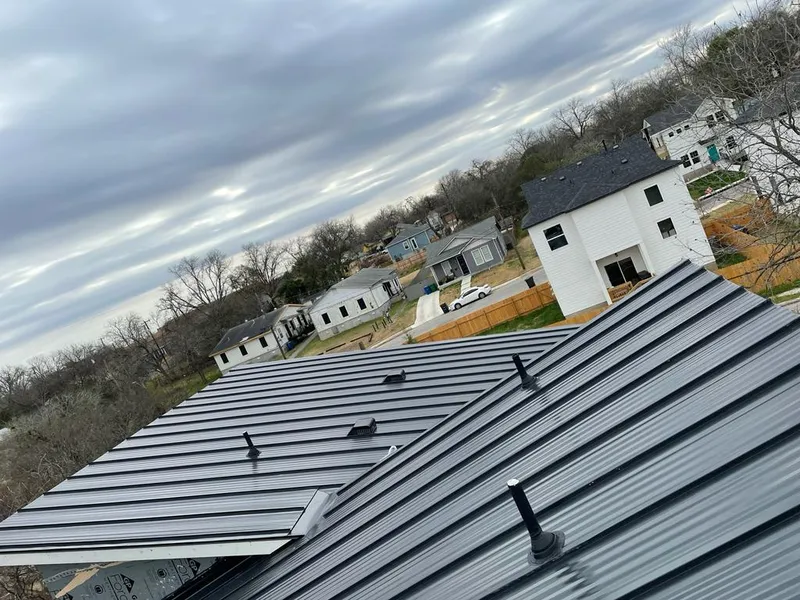 Standing seam metal roof panels with vents for Skylight Repair in North Providence